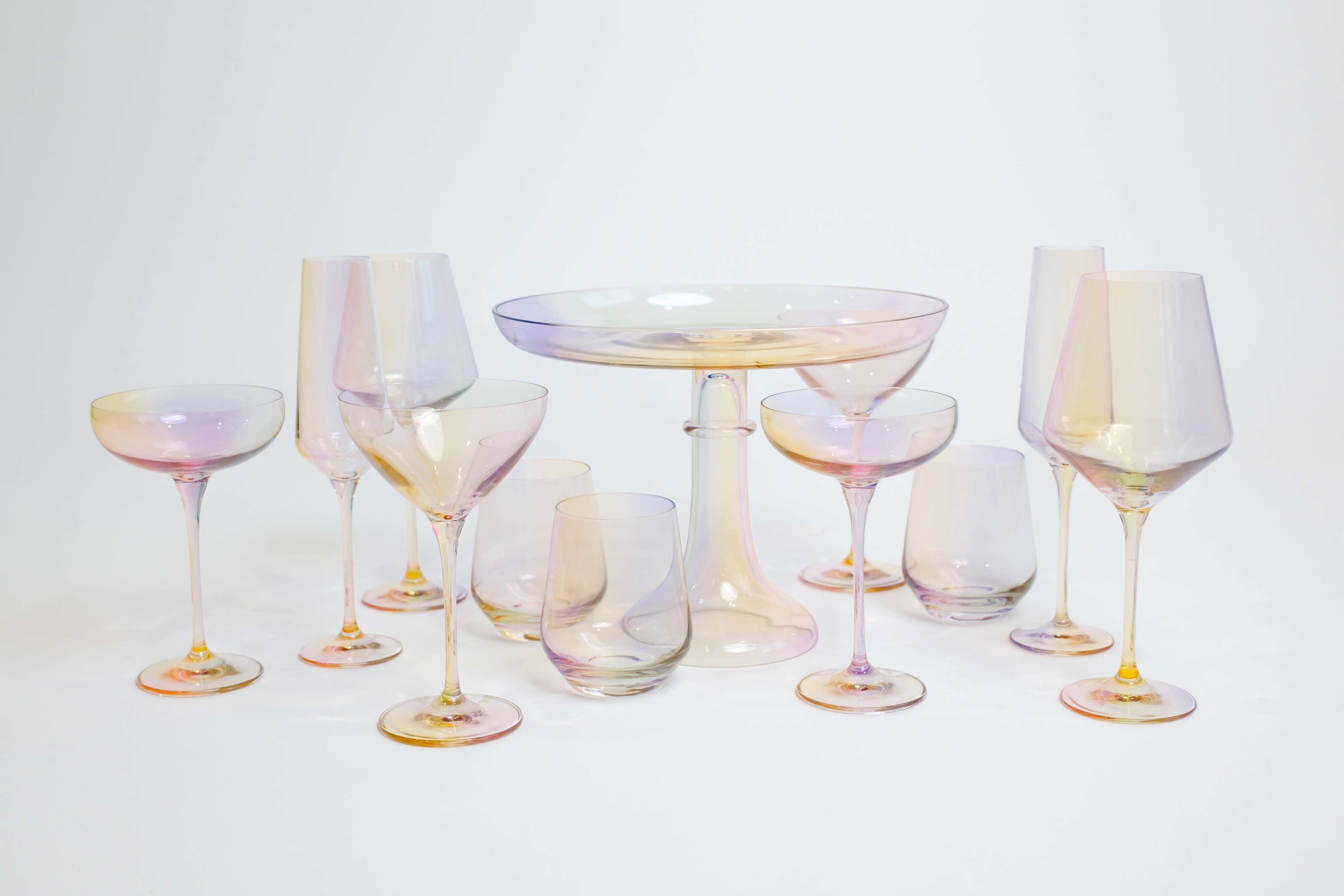Glow up your space with our Iridescent Collection 🌈 Estelle Colored Glass